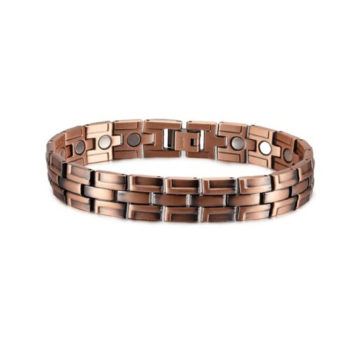 Blå och svart metallklockarmband på grå yta