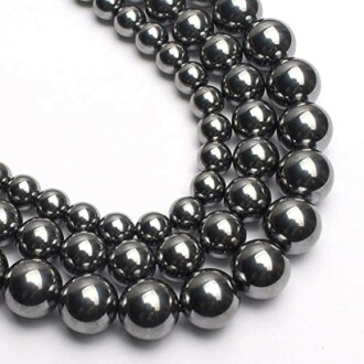Metalliska pärlor i olika storlekar